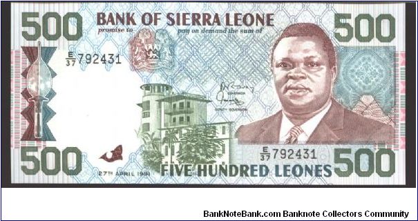 Red-brown and dark green on multicolour underprint. Modern building below arms at leftc enter. Two fishinf boats at left center, artistic carp at right on back. Banknote