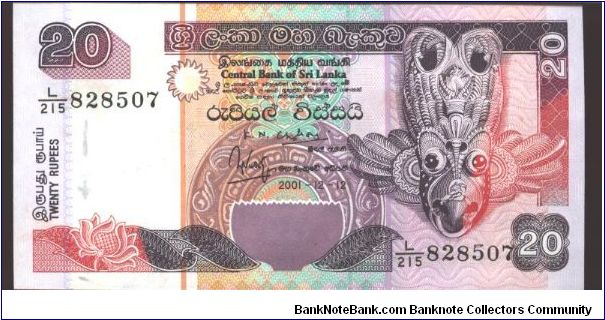 Like #103 109

With additional secruity features.

Purple and red on multicolour underprint. Native bird mask at right. Two youths fishing, sea shells on back. Banknote