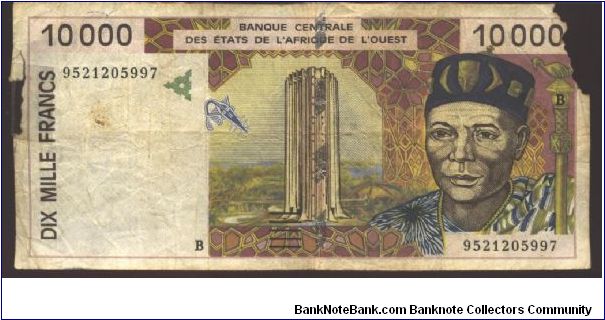 Dark brown on multicolour underprint. Headman with scepter at right and as watermark, skyscraper at center. Native art at left, woman crossing vine bridge over river at center on back. Banknote