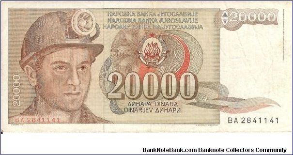 Brown on multicolour underprint. Miner at left and as watermark, arms at center. Mining equipment at center on back. 

Signature 13 Banknote