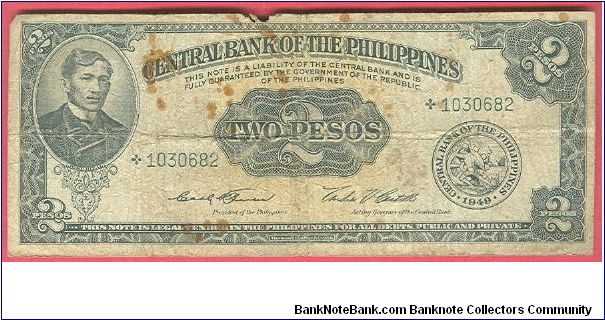 Two Pesos English Series P-134c sign 4 STARNOTE. This is one of starnote seldom seen replacement notes in the series. Banknote