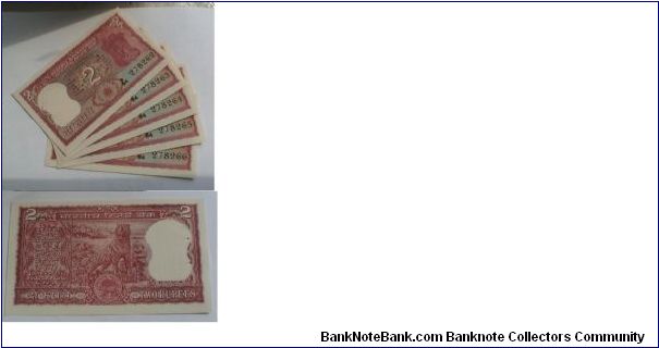 2 Rupees. Manmohan Singh signature. Banknote
