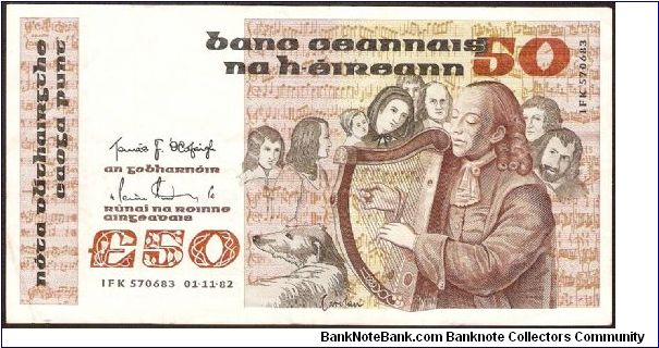 50 Pounds.

Turlough O'Carolan playing harp in front of group at center right on face; musical instruments on back.

Pick #74a Banknote