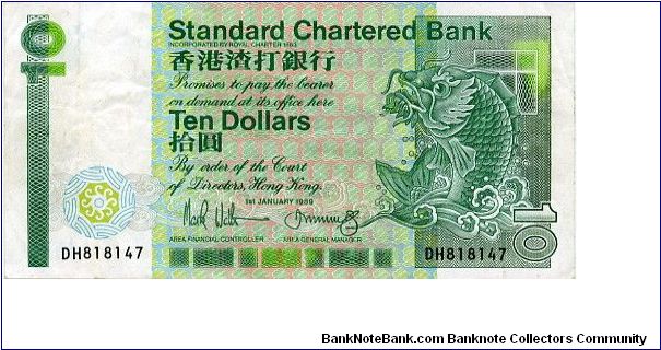 Standard Chartered Bank
$10
Green/Blue/Pink
Value & Mythological Carp 
Bank building & Arms
Security thread
Watermark Helmeted head Banknote