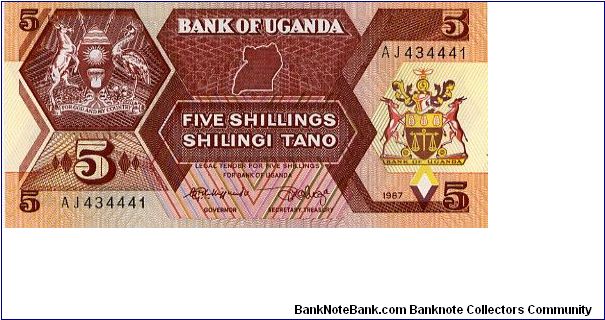 5 Shillings
Brown/Yellow
Coat of arms each side of value
Wild Animals at waterhole & Mountain
Security thread
Watermark Bird Banknote