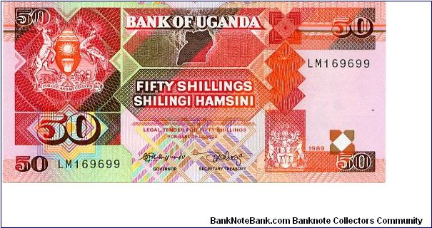 50 Shillings
Red/Purple/Green
Coat of arms each side of value
Parliment buildings
Security thread
Watermark Bird Banknote