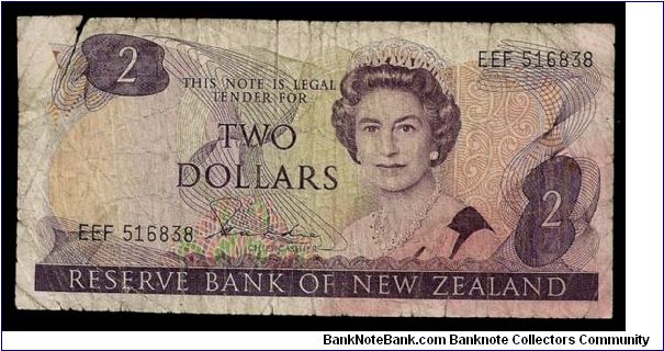 Reserve Bank of New Zealand 2 dollars, P-170a # EEF 516838. Very low grade condition: looks like its been lodged in a back-packers jean pocket and then through the wash, giving a beautiful surf-like texture. Banknote