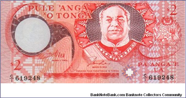 2 Pa'anga. King on front, village scene on back Banknote