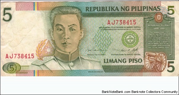 Philippine 5 Pesos note with red serial number. Banknote