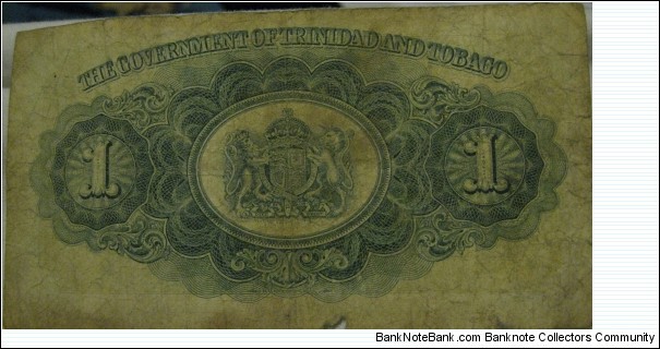 1942 1 dollar, bit discoloured with a small rip at the bottom Banknote