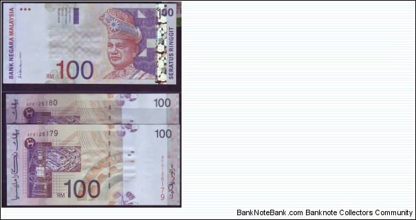 RUNNING PAIR RM100. PREFIX AF. SIGNED BY ALI ABUL HASSAN AT THE CORNER SIDE Banknote