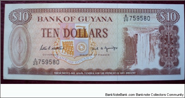 Bank of Guyana |
10 Dollars |

Obverse: Coat of Arms, Kaieteur Falls on the Potaro River in central Guyana |
Reverse: Bauxite mining and Alumina plant |
Watermark: Head of a Macaw parrot Banknote