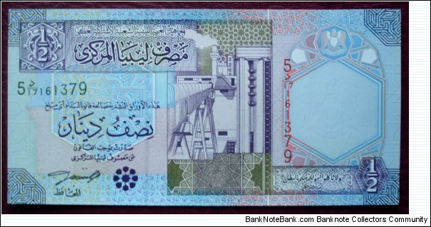 Central Bank of Libya |
½ Dinar |

Obverse: Oil refinery |
Reverse: Irrigation system and Wheat ears |
Watermark: Libyan Coat of Arms Banknote