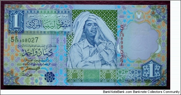 Central Bank of Libya |
1 Dinar |

Obverse: Mu‘ammar al-Qaḏāfī |
Reverse: Mosque |
Watermark: Libyan Coat of Arms Banknote
