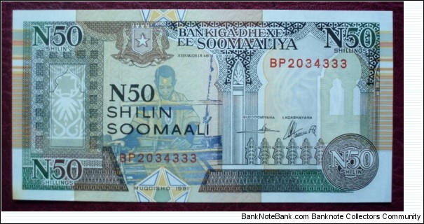 Bankiga Dhexe ee Soomaaliya |
50 New Shilin |

Obverse: Loom worker and Architectural elements |
Reverse: People with donkey and Banana trees |
Watermark: Man in a headdress (turban) Banknote