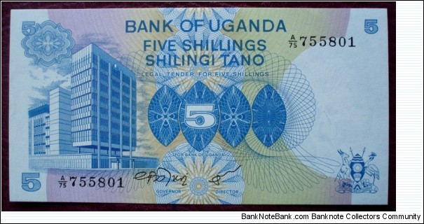 Bank of Uganda |
5 Shilingi |

Obverse: Bank of Uganda |
Reverse: Coffee bean picking Banknote