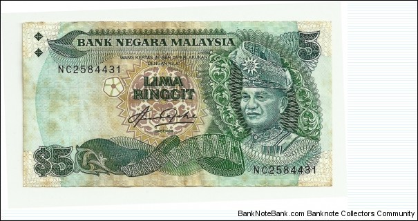 RM5 #NC 2584431 Cross variety Blindman issue Signed by Abdul Aziz Taha Printer: Thomas De La Rue Banknote