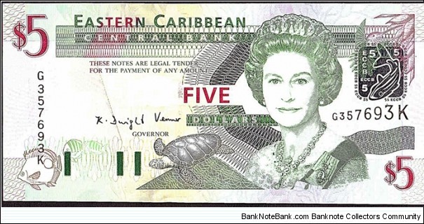 St. Kitts N.D. (2003) 5 Dollars.

Unevenly cut at both top & bottom.

Ink spot above '3' in the right hand serial number. Banknote