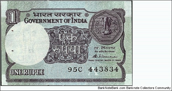 India 1986 1 Rupee.

Cut unevenly.

Inset letter 'A'. Banknote