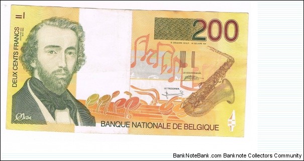 1995 BELGIUM 200 FRANCS
Black and brown on yellow and orange underprint. Adolphe Sax at left, saxophone at right. Signature (5 and 15). Back: Saxophone players outlined at left, church, houses in Dinant outlined at lower right. Watermark: Adolphe Sax. Banknote