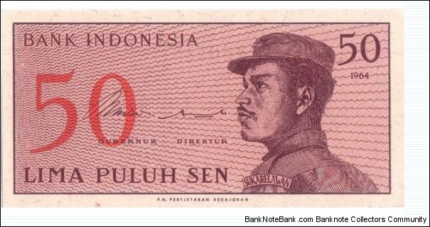 50 Sen  
1964. Purple and red. A volunteer man in uniform at right.
 Banknote