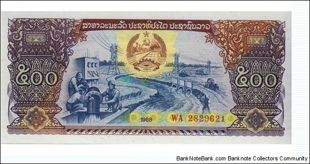 500 Kip  
1988. Dark brown, purple and deep blue on multicolor underprint. Modern irrigation systems at center, arms above. Back: Harvesting fruit at center. Watermark: Stars, hammer and sickles.
 Banknote