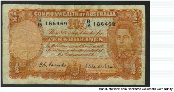 1952 10 Shilling Note. Has Coombs & Wilson signatures. Last year of the orange print.  Banknote