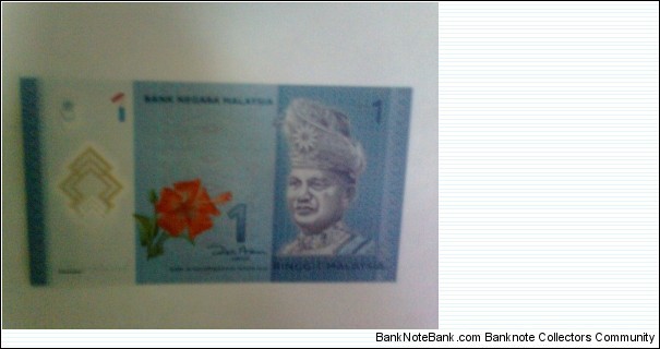 malaysia new 1 ringgit(polymer). same serial number as the new malaysian 5 ringgit(polymer)  Banknote