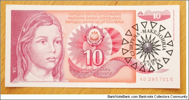 Sovereign Macedonia | 
10 Dinara, 1991 | 

Obverse: Young Southern Slavic girl, Yugoslav National Coat of Arms and Overprint of the Macedonian sun with country name and new date | 
Reverse: Abstract potpourri hotchpotch of numbers and letters with a pixelized eye in the middle | 
Watermark: School girl | Banknote