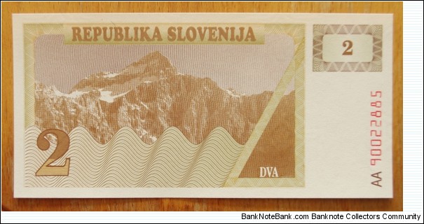 Slovenia | 
2 Tolarja, 1990 | 

Obverse: Triglav mountain (2,864 m.), the highest peak of the Julian Alps | 
Reverse: Knežji Kamen – The Prince's Stone at Klagenfurt Landhaus, and The Carniolan honey bee on an underprint of a honeycomb | 
Watermark: Repeated symmetrical crosses | Banknote