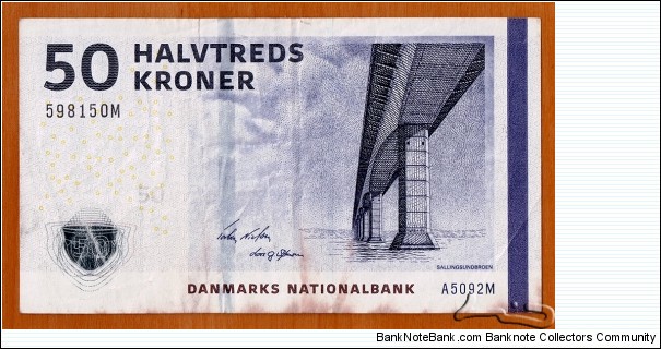 Denmark | 
50 Kroner, 2009 | 

Obverse: Sallingsund Bridge (1978-), between Nykøbing and Roslev, is 1717 metres long | 
Reverse: Locations of Sallingsund and Skarp Salling marked on the map of northern Denmark, and The Skarpsalling Vessel from Skarpsalling in Himmerland (Jutland), was found in a burial chamber in 1891, and is one of the finest examples of pottery design and decoration known from Stone Age Denmark. It was created when the barrows were built in approximately 3200 BC, when pottery as a craft was at its peak. Clay vessels were used during the burial rituals – some pots with contents were stored in the barrows and others were put at the entrance to the chambers | 
Watermark: 50, and Front of a Viking ship | Banknote