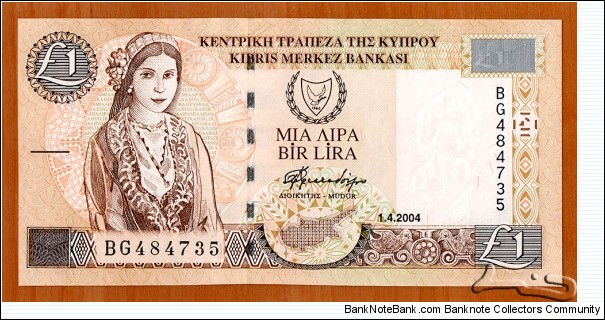 Cyprus | 
1 Lira, 2004 | 

Obverse: Cypriot girl in traditional costume, and the National Coat of Arms | 
Reverse: Cypriot handicrafts, and Kato Drys village scene | 
Watermark: Bust of Aphrodite | Banknote
