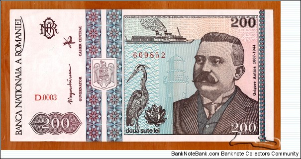 Romania | 
200 Lei, 1992 | 

Obverse: Portrait of the Romanian biologist Grigore Antipa (1867-1944), Paddle wheel steamer vessel (steamboat), Grey Heron, and Sulina Observer Lighthouse | 
Reverse: Map of Danube River Delta, Grey Herons, Fish and fishing net | 
Watermark: Bank monogram 