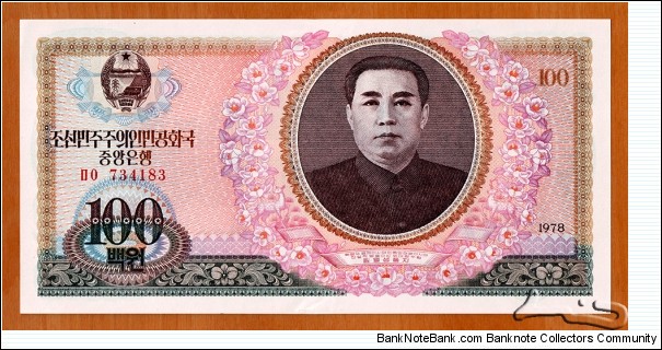 North Korea | 
100 Wŏn, 1978 | 

Obverse: Portrait of Kim Il-sung (1912-1994) surrounded by a wreath of magnolia flowers | 
Reverse: Mangyongdae - the birthplace of Kim Il-sung | Banknote