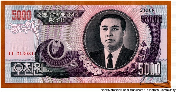 North Korea | 
5,000 Wŏn, 2006 | 

Obverse: Portrait of Kim Il-sung, and Siebold's Magnolia (Magnolia sieboldii) flowers | 
Reverse: Mangyongdae - the birthplace of Kim Il-sung | 
Watermark: Arch of Triumph in Pyongyang | Banknote