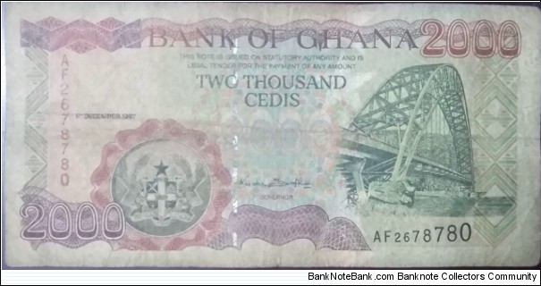 
2,000 GH₵ - Ghanaian cedi
Red-brown, green, and multicolored. Suspension bridge at right. Fisherman loading nets into boat at left center on back. Arms at lower left on face and as watermark. Banknote